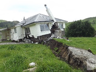 Bluff station. Kekerengu Fault rupture displacing the road and house by ~10 metres. Photo by Tim Little