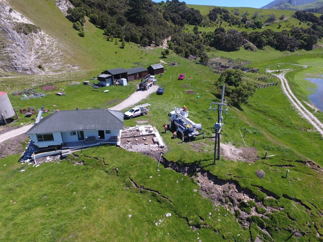 Displaced house and road from surface rupture. From GeoNet.org.nz site, photo by Tim Little
