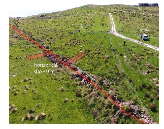 One of Tim and Russ’s trenches (pink rectangles) was cut in half by movement on the Kekerengu Fault (red line. The two sides of the trench are now about nine metres apart. Drone photo by Julian Thomson