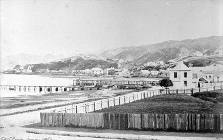 Lambton Quay, Wellington, looking south from Brandon's Corner 1860. [Denton, Frank J, 1869-1963. Ref #: 1/2-003924-G Collection of negatives, prints and albums PAColl-3043]